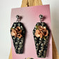 Enchanted Coffin Earrings – Dark Elegance with a Floral Twist