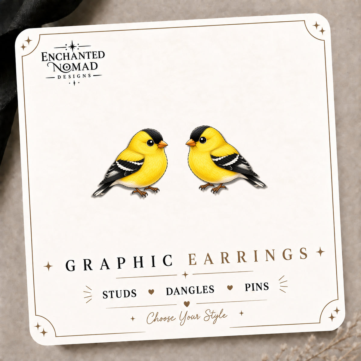American Goldfinch Stud Earrings on the tilted Enchanted Nomad Designs card