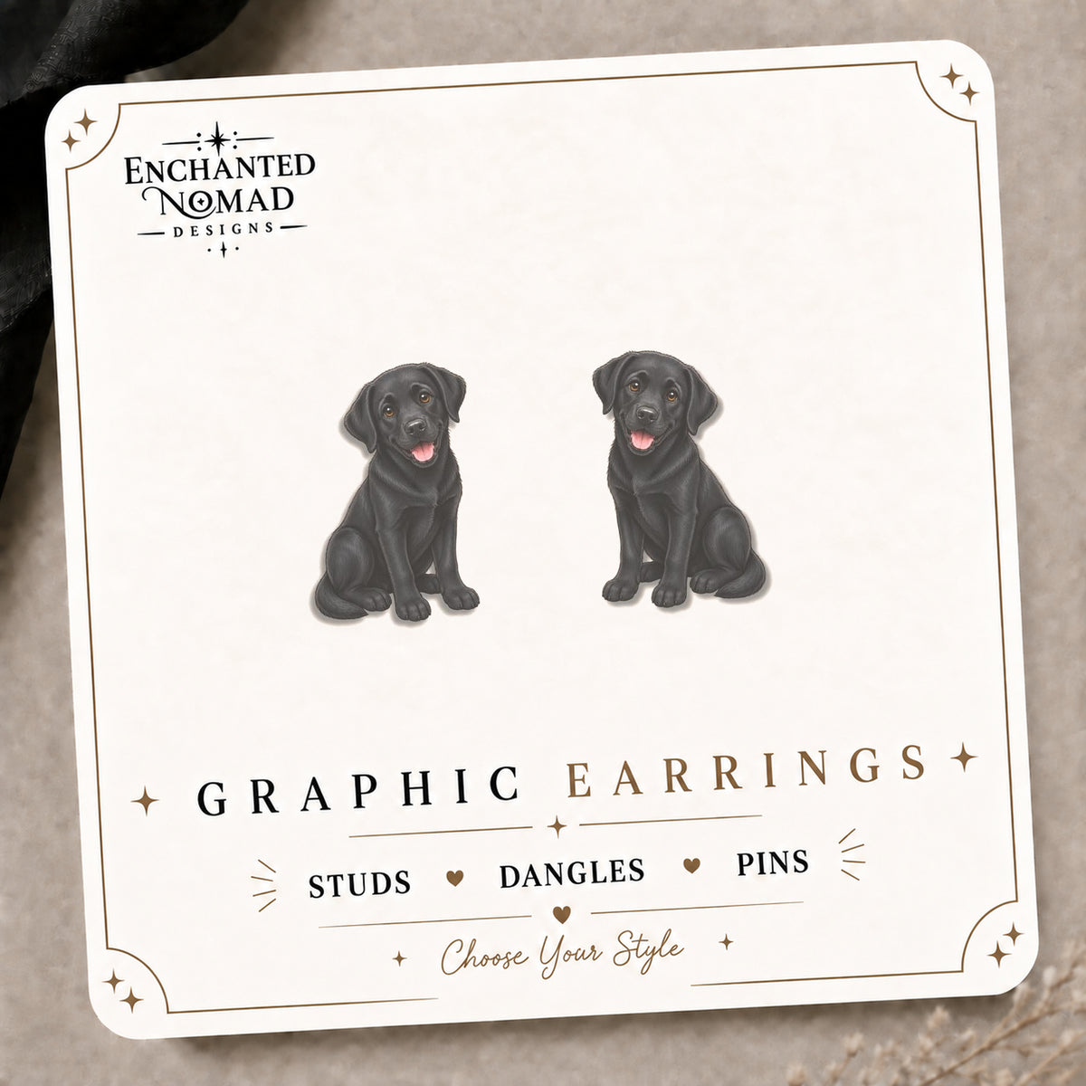 Black Labrador Puppy Stud Earrings on the tilted Enchanted Nomad Designs card