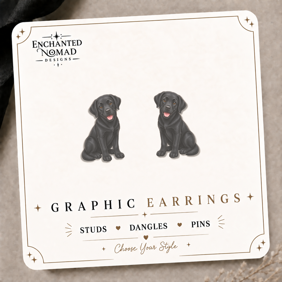 Black Labrador Puppy Stud Earrings on the tilted Enchanted Nomad Designs card