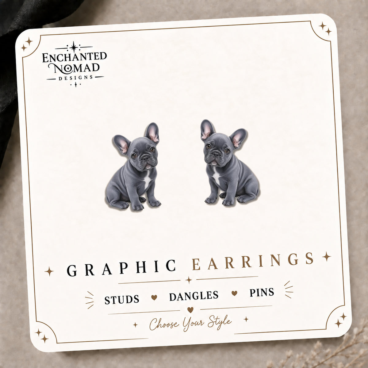 Blue French Bulldog Stud Earrings on the tilted Enchanted Nomad Designs card