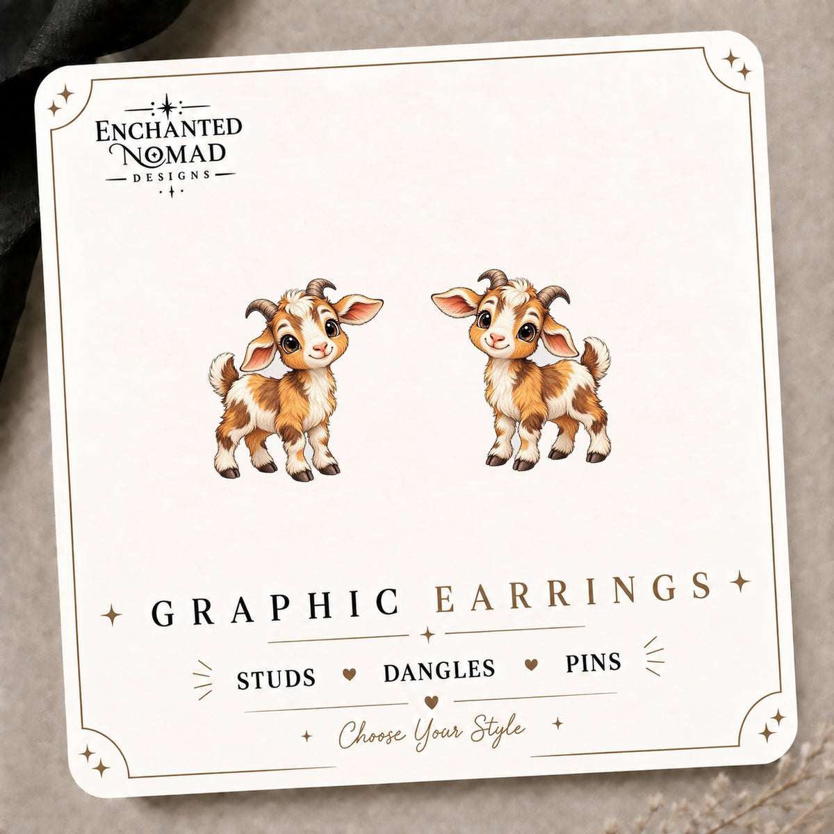 Brown Farm Goat Stud Earrings on the tilted Enchanted Nomad Designs card