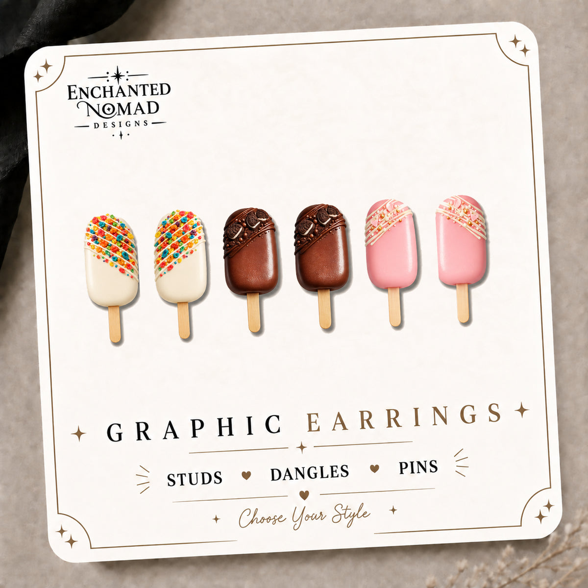 Cakesicle Graphic Stud Earrings on the tilted Enchanted Nomad Designs card