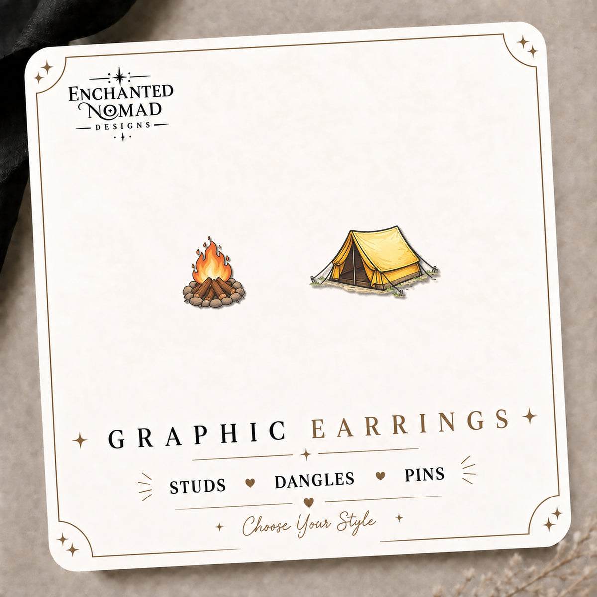 Campfire Tent Earrings & Pins on the tilted Enchanted Nomad Designs card