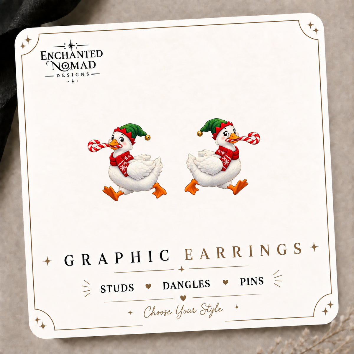 Candy Cane Christmas Goose Stud Earrings on the tilted Enchanted Nomad Designs card