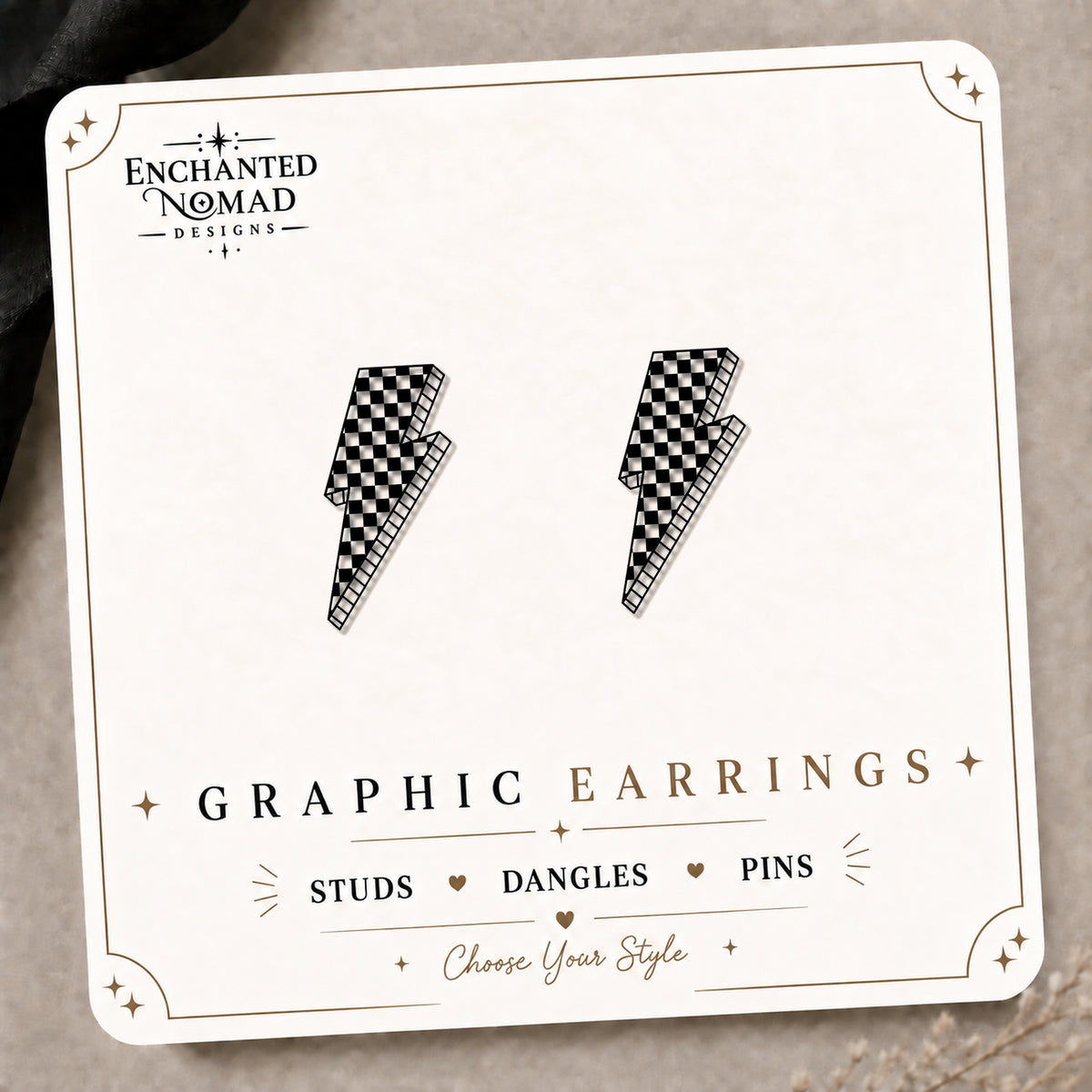 Checkered Lightning Bolt Stud Earrings on the tilted Enchanted Nomad Designs card