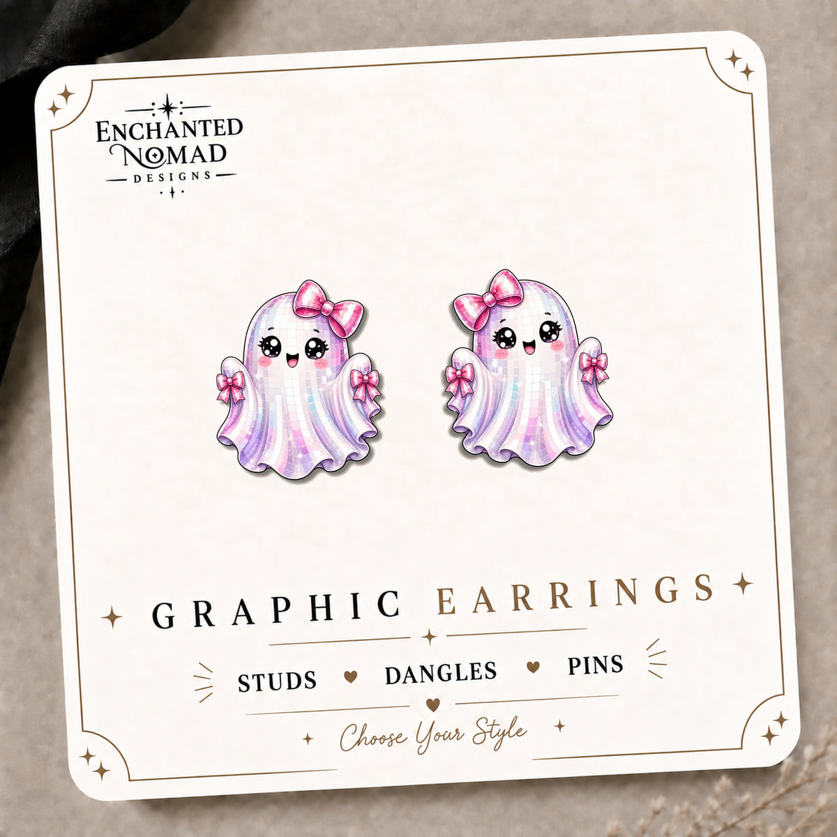 Coquette Ghost Bow Stud Earrings on the tilted Enchanted Nomad Designs card
