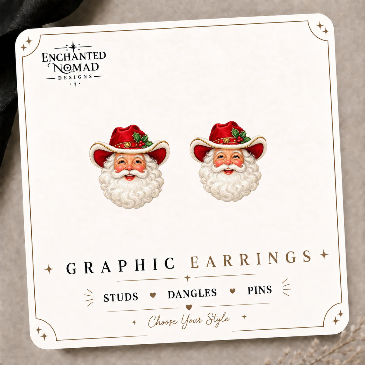 Cowboy Santa Stud Earrings on the tilted Enchanted Nomad Designs card