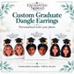 Custom graduation photo earrings with black graduation cap toppers and gold tassels, sold as a matching pair.