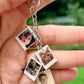 Custom keychain with four miniature instant-photo charms