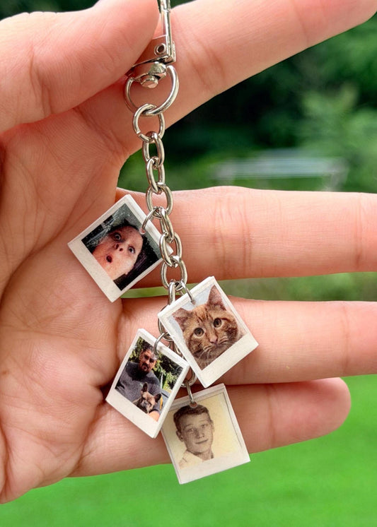 Custom keychain with four miniature instant-photo charms