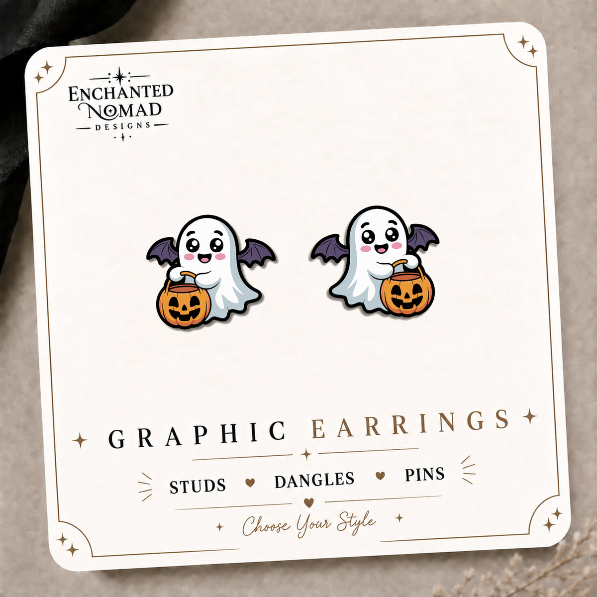 Ghost & Bat Stud Earrings on the tilted Enchanted Nomad Designs card