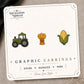 Green Tractor Stud Earrings on the tilted Enchanted Nomad Designs card