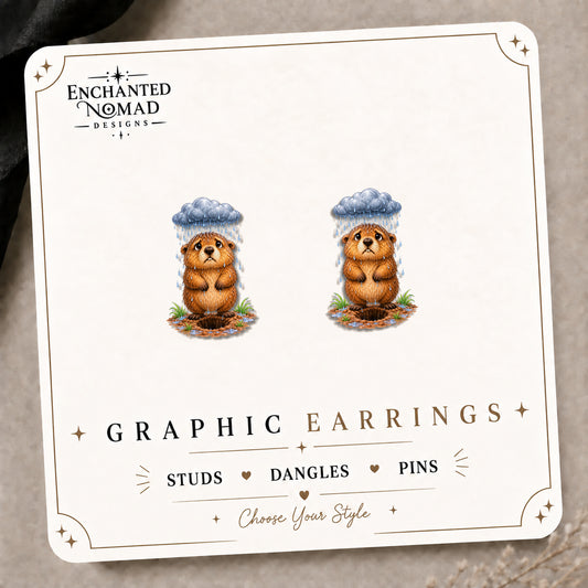 Groundhog Rain Cloud Stud Earrings on the tilted Enchanted Nomad Designs card