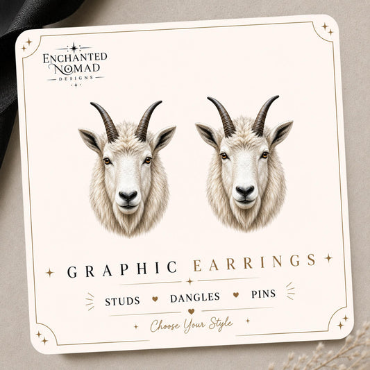 Mountain Goat Earrings & Pins on a branded display card