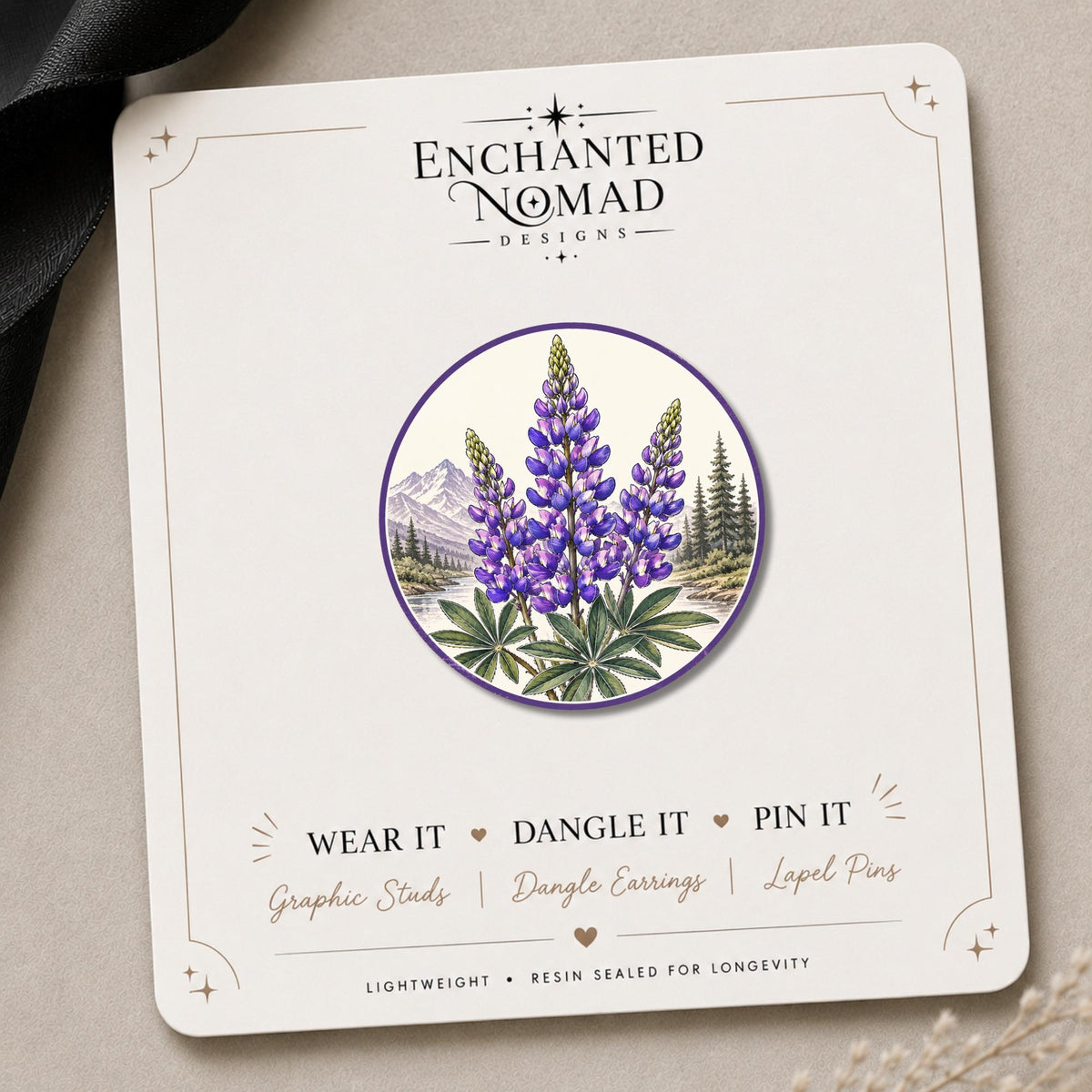 Lupine Flower Earrings & Pins on a branded display card