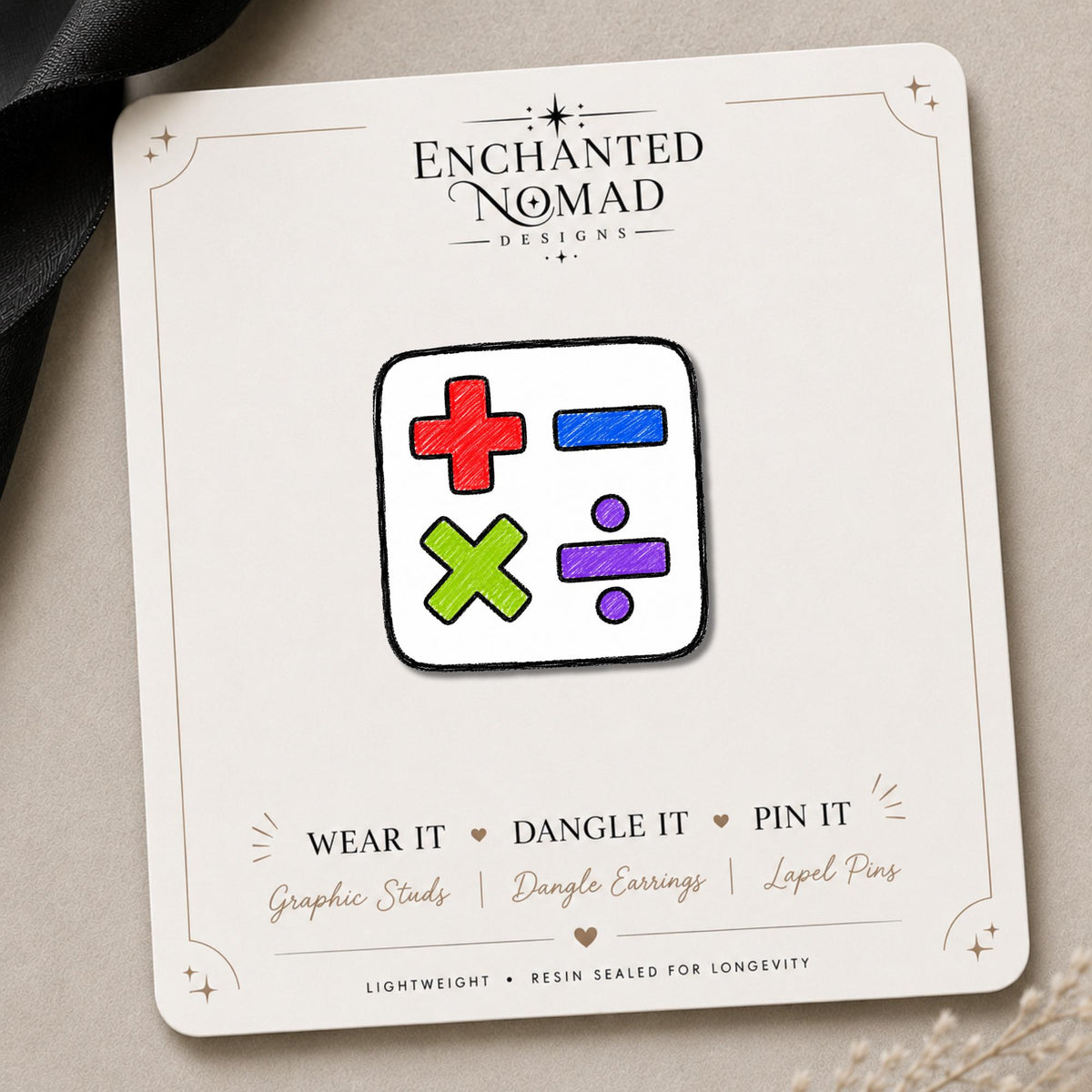 Math Symbol Earrings & Pins on a branded display card
