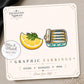 Sardine and Lemon Earrings & Pins on a display card