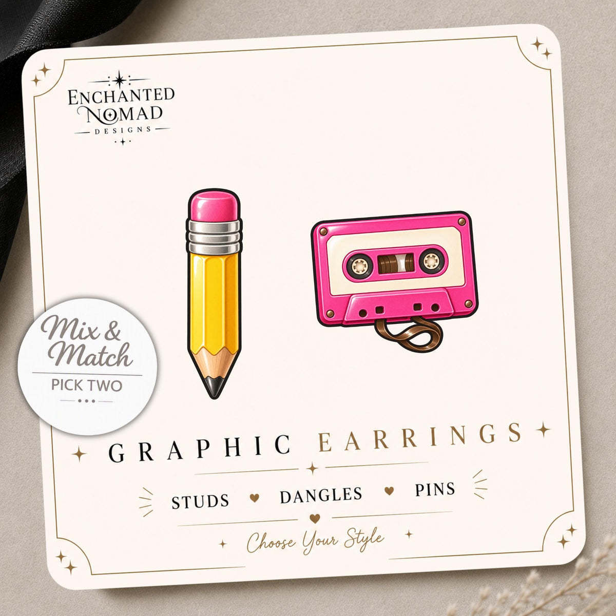 Pencil and Cassette Earrings & Pins on a display card
