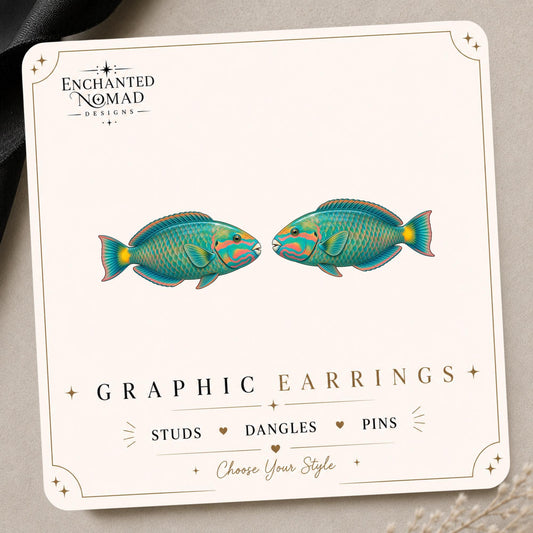 Parrotfish graphic earrings and pins on a display card