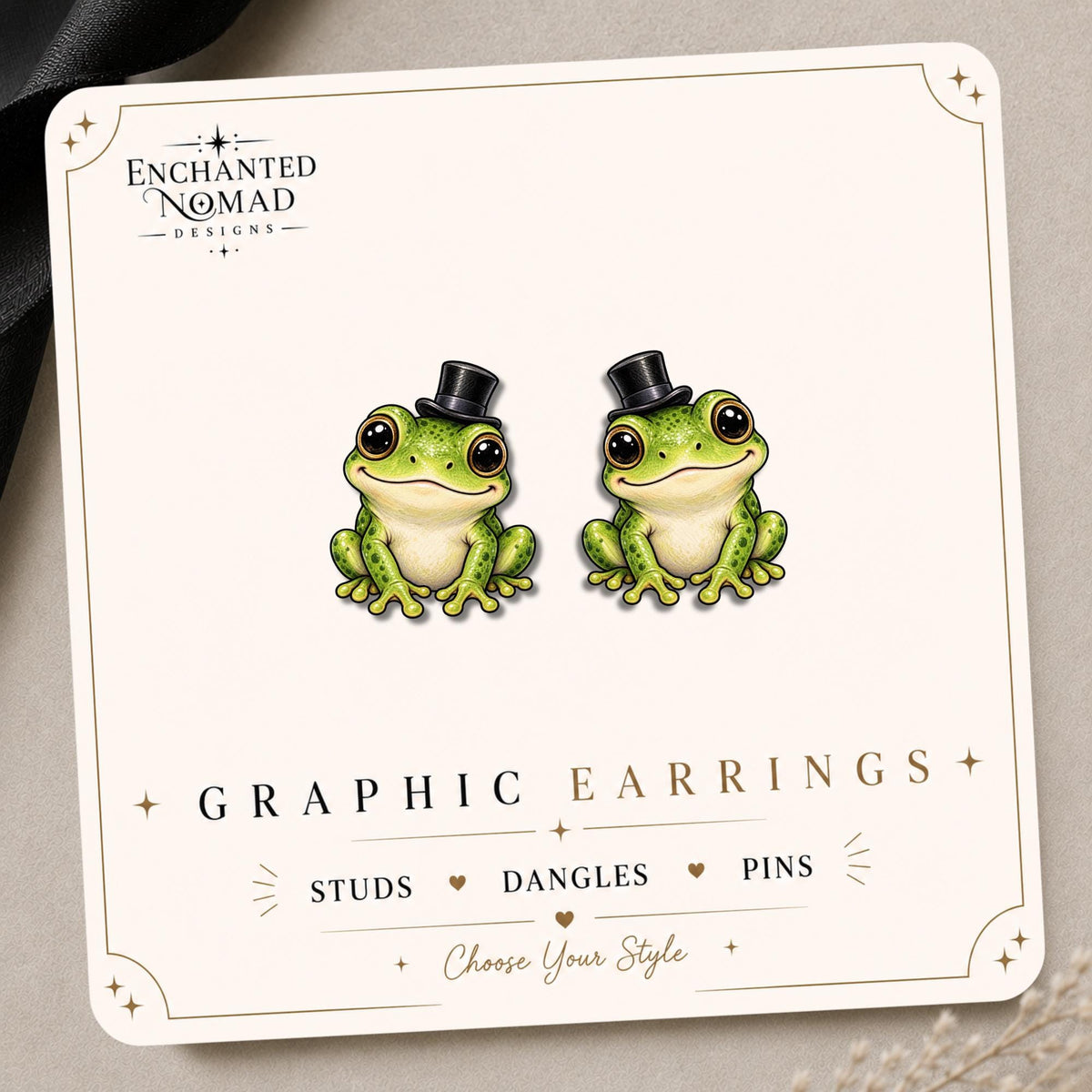 Sir Ribbington Top Hat Frog Earrings & Pins on a branded display card