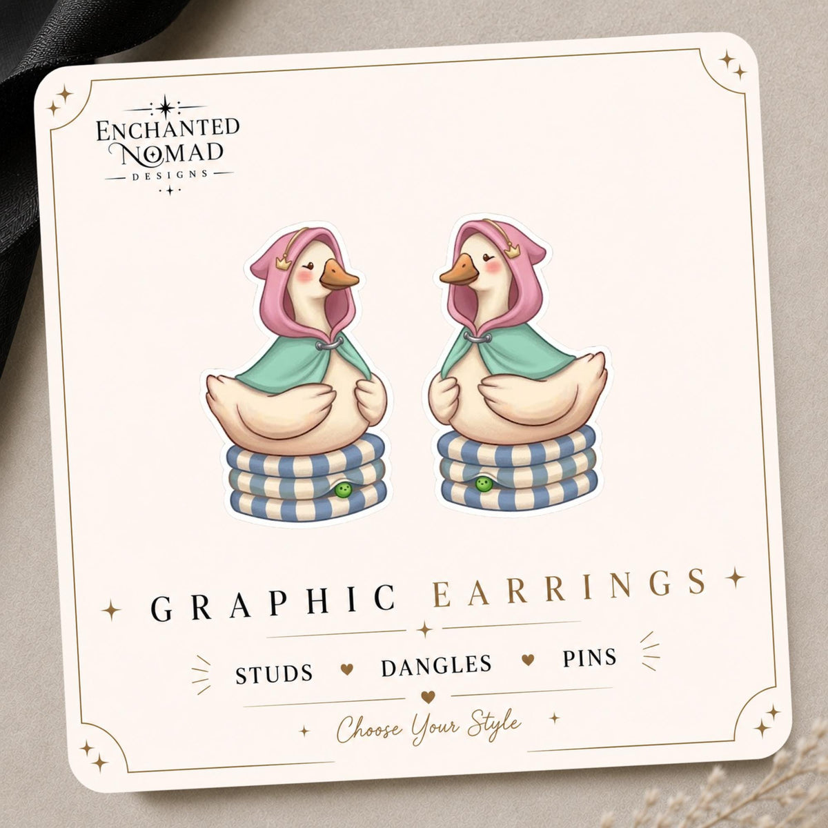Princess Goose on Mattresses Earrings & Pins on original display card