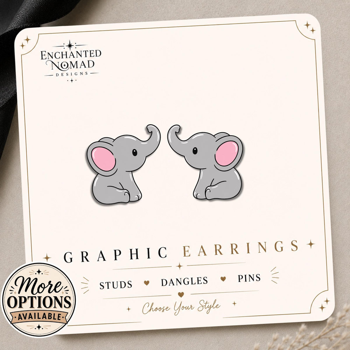 Colorful Elephant Earrings & Pins on a display card