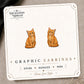 Illustrated Orange Tabby Cat Stud Earrings on the tilted Enchanted Nomad Designs card