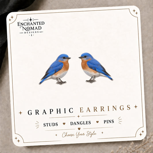 National Park Inspired Bluebird Stud Earrings on the tilted Enchanted Nomad Designs card