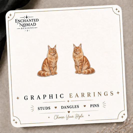 Orange Maine Coon Cat Stud Earrings on the tilted Enchanted Nomad Designs card