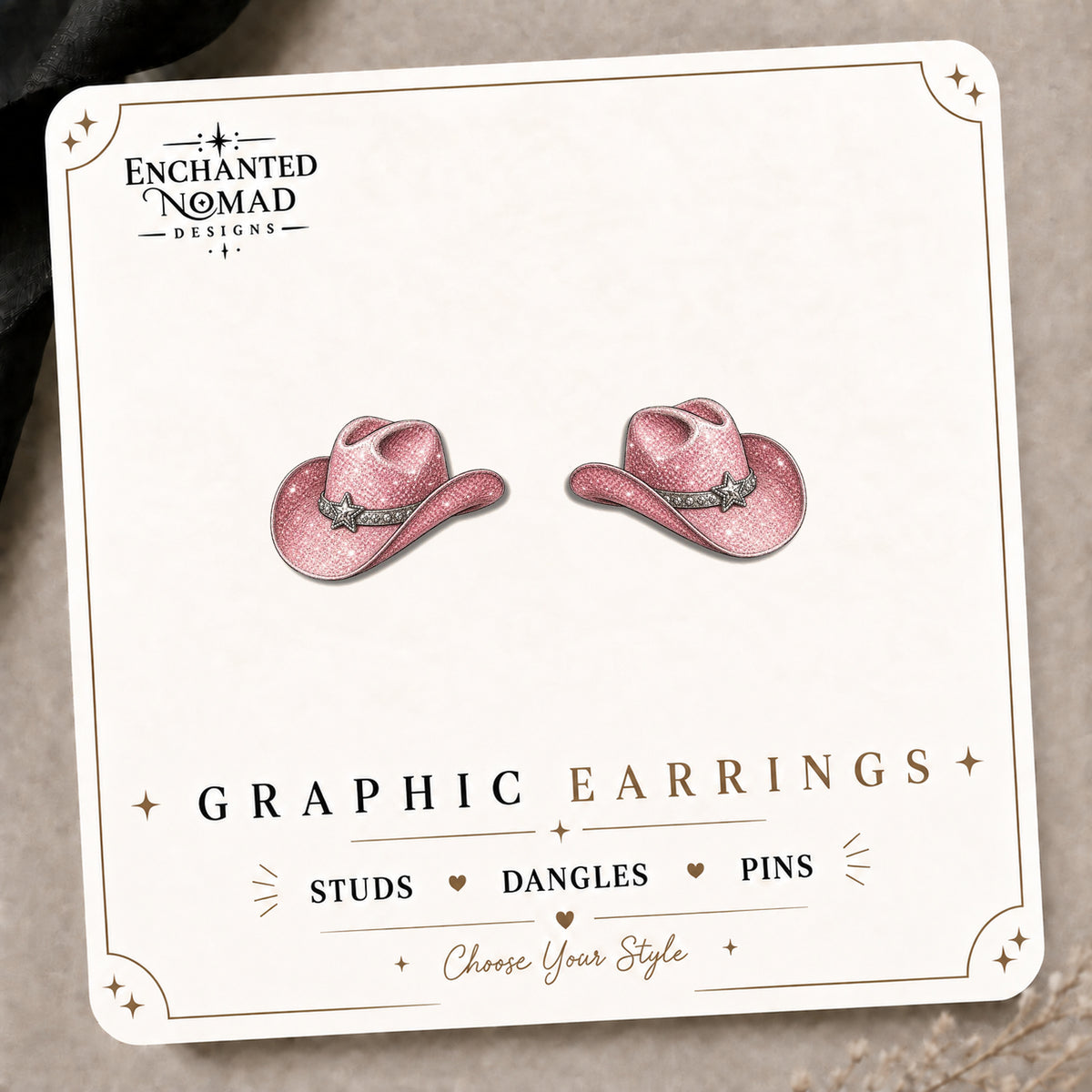 Pink Glitter-Style Cowgirl Hat Stud Earrings on the tilted Enchanted Nomad Designs card