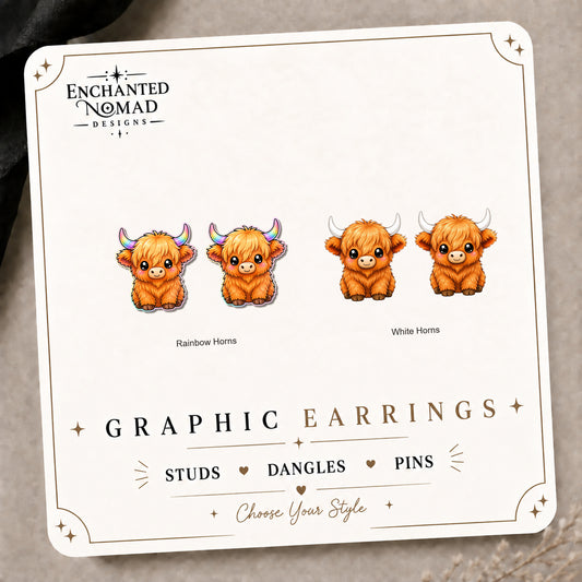 Rainbow Horn Highland Cow Stud Earrings on the tilted Enchanted Nomad Designs card