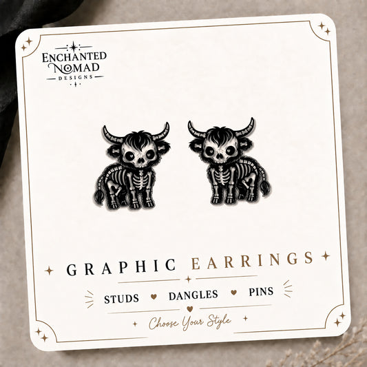 Skeleton Highland Cow Stud Earrings on the tilted Enchanted Nomad Designs card