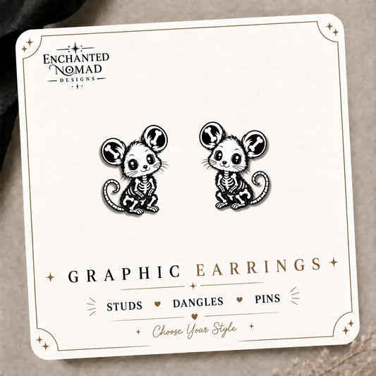 Skeleton Mouse Stud Earrings on the tilted Enchanted Nomad Designs card