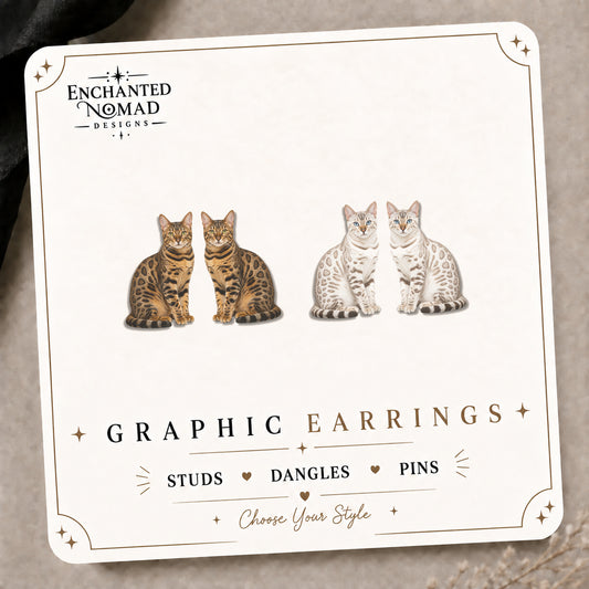 Snow Bengal Cat Stud Earrings on the tilted Enchanted Nomad Designs card