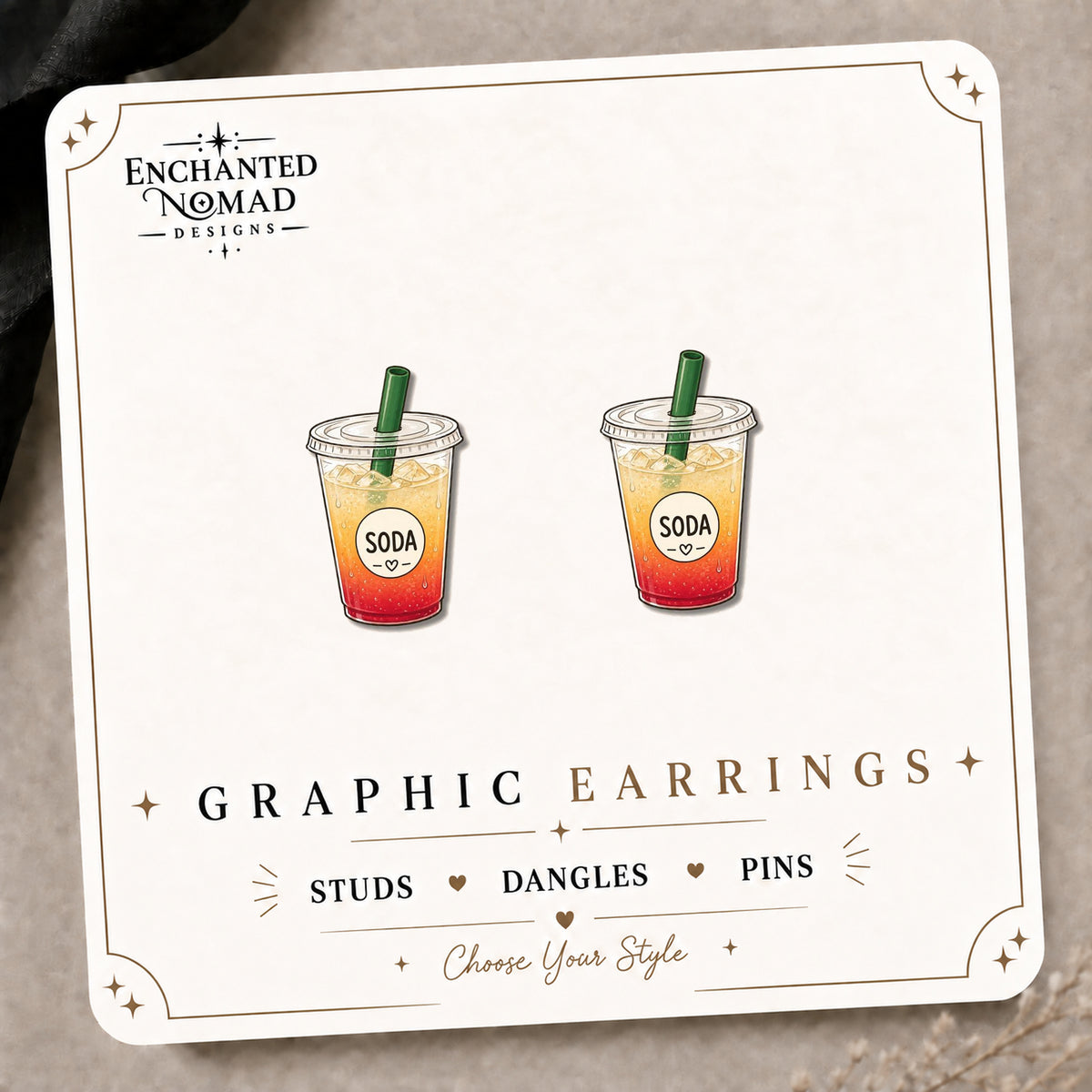Sunrise Soda Drink Earrings & Pins on the tilted Enchanted Nomad Designs card