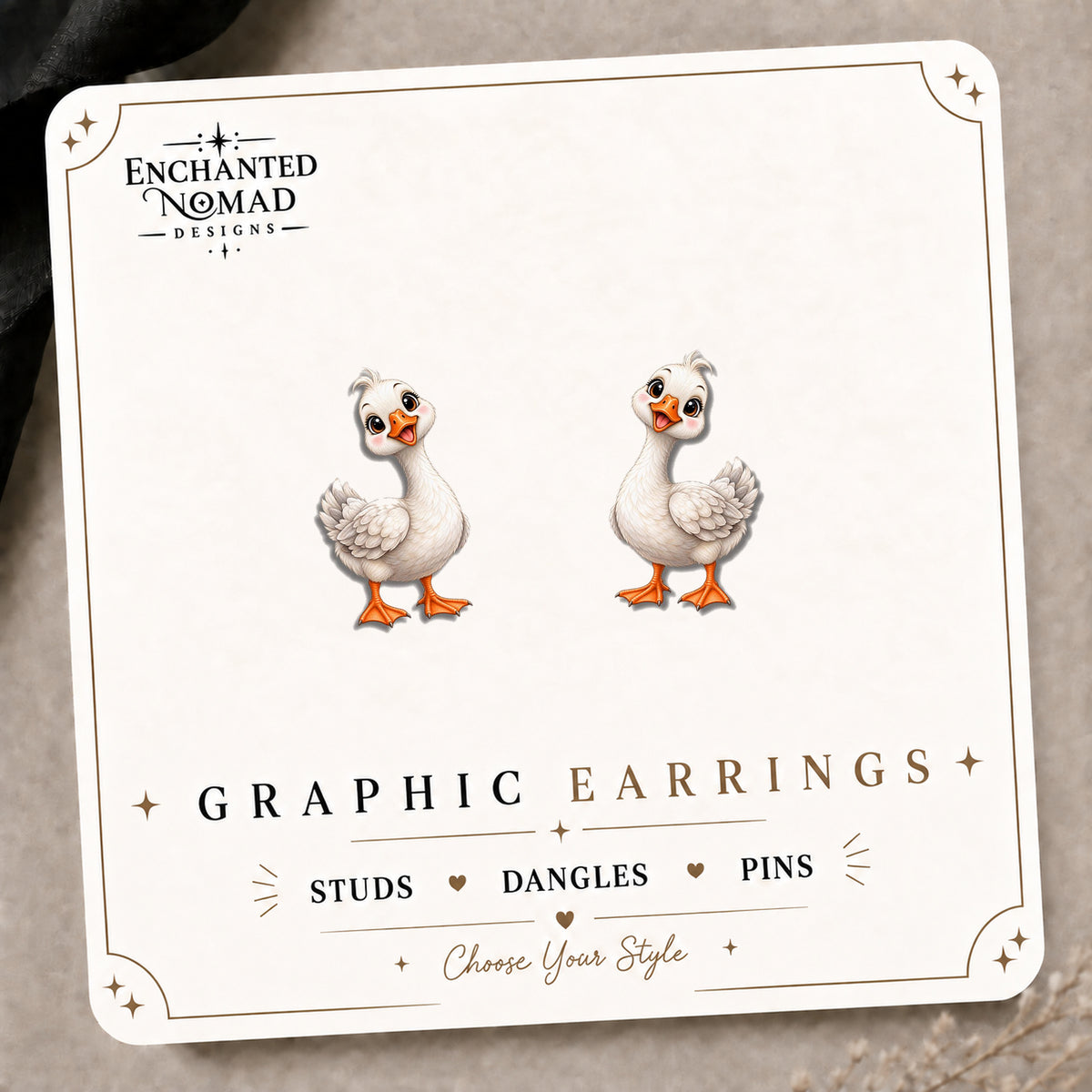 White Farm Goose Stud Earrings on the tilted Enchanted Nomad Designs card