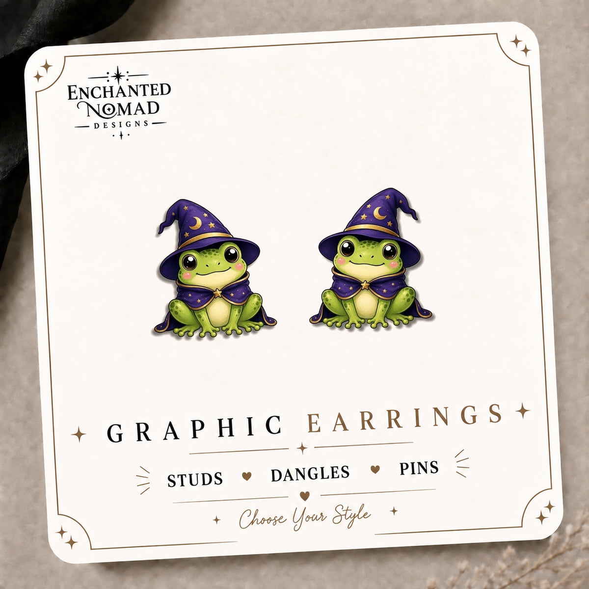 Wizard Frog Stud Earrings on the tilted Enchanted Nomad Designs card